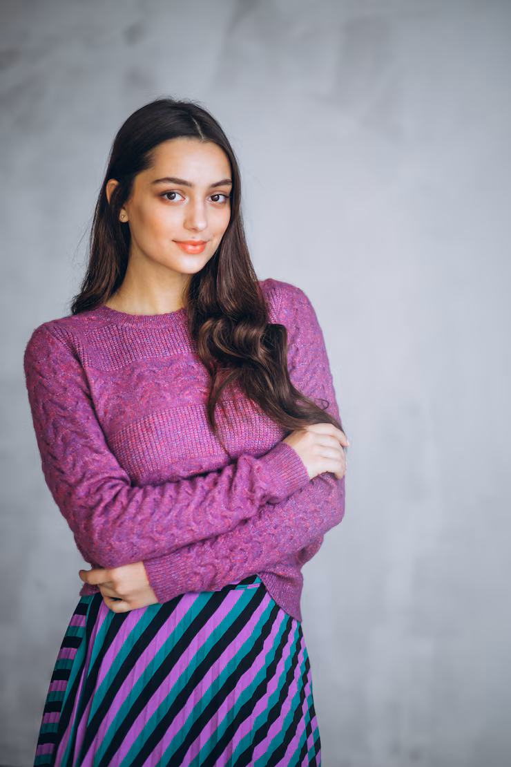 beautiful-woman-purple-sweater-skirt_1303-17487